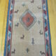 Pair of 60 x 120 Peruvian wool rugs