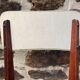 Pair of vintage chairs with upholstered backrest and seat, 1950s style.