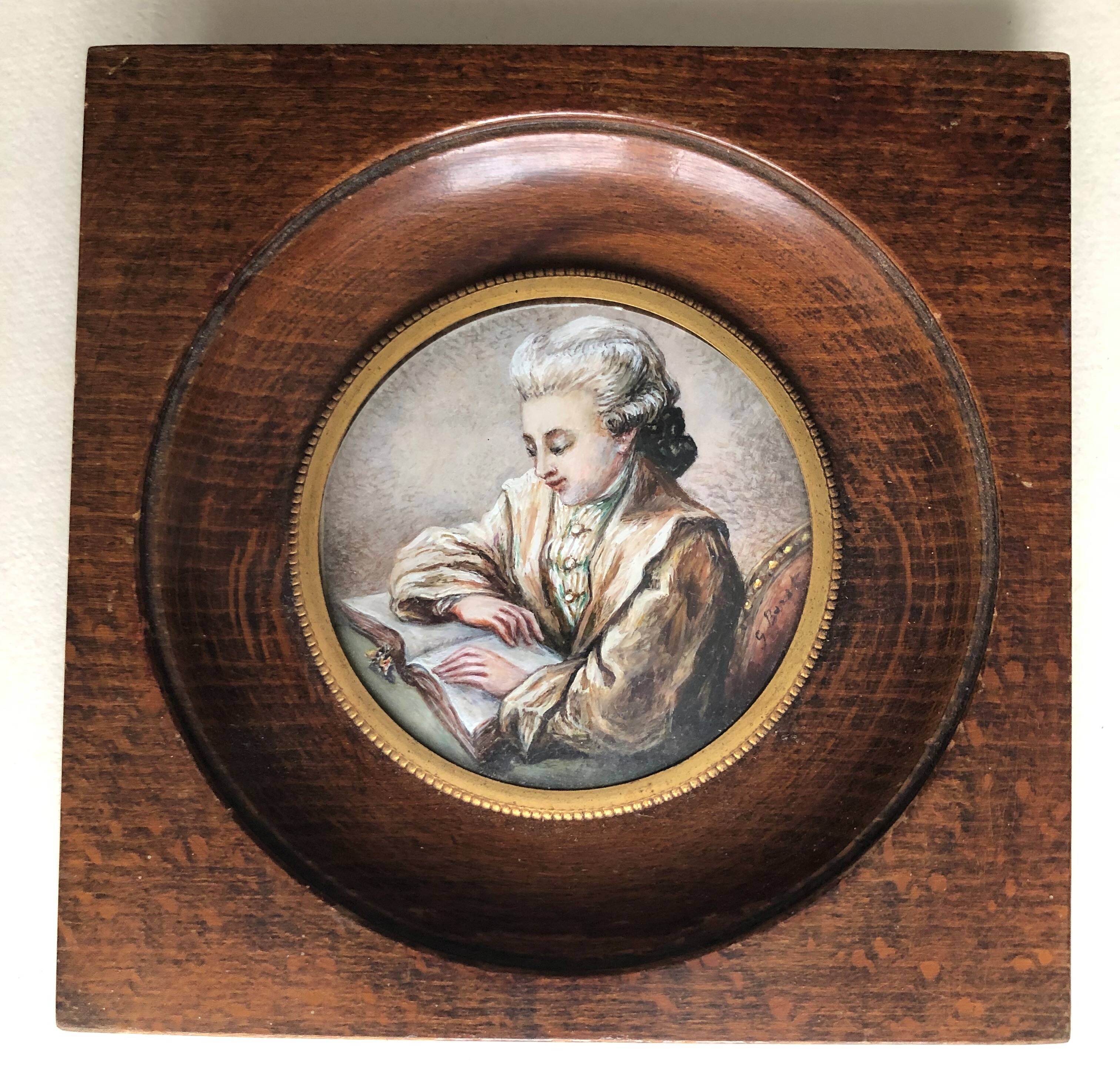 Miniature oil on ivory: Young reader
