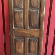 France old 18th century walnut closet door. Composed of 8 finely carved panels.