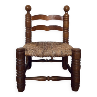Chaise basse paillée style Charles Dudouyt