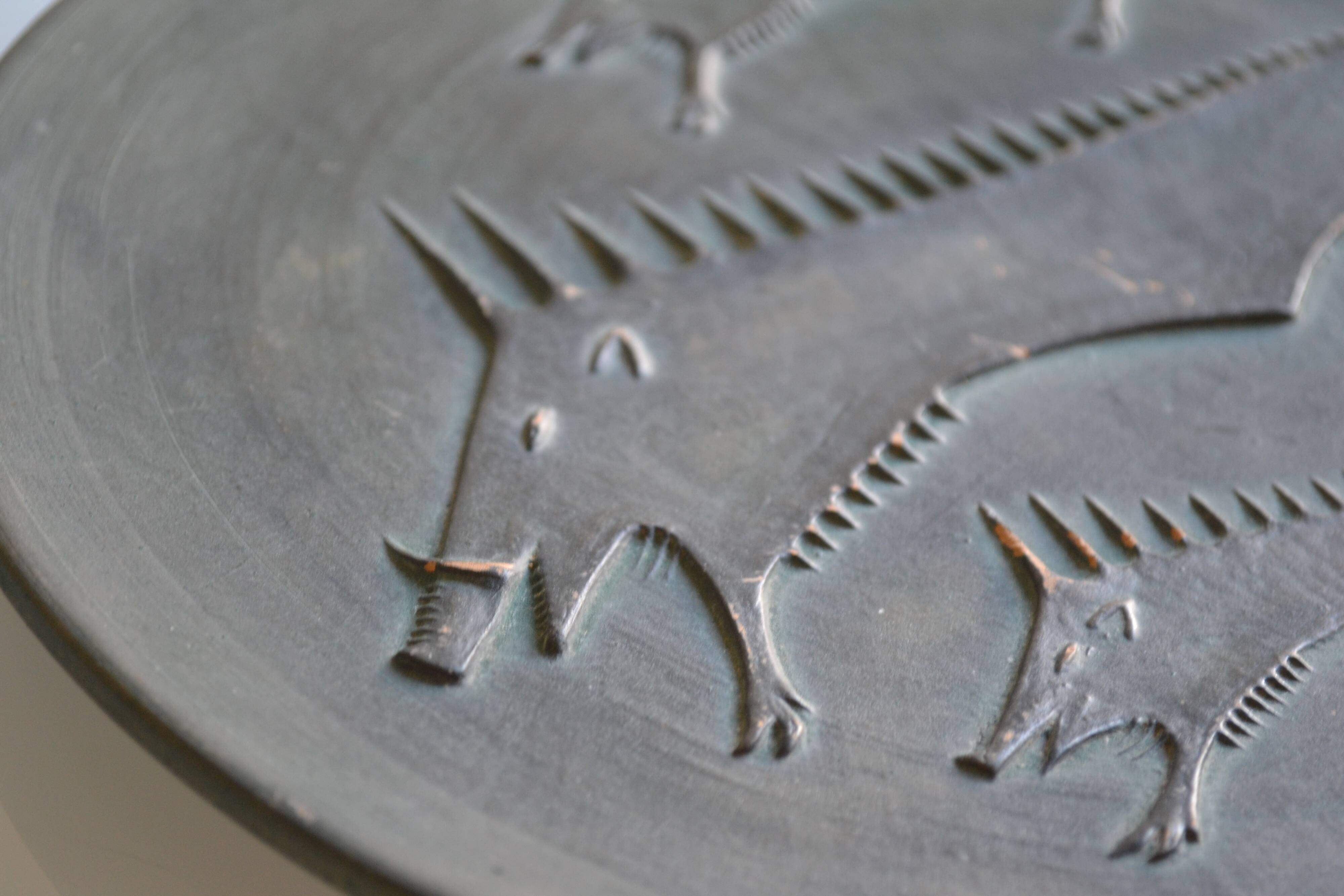 Ceramic wall plate attributed to Wim Mühlendyk