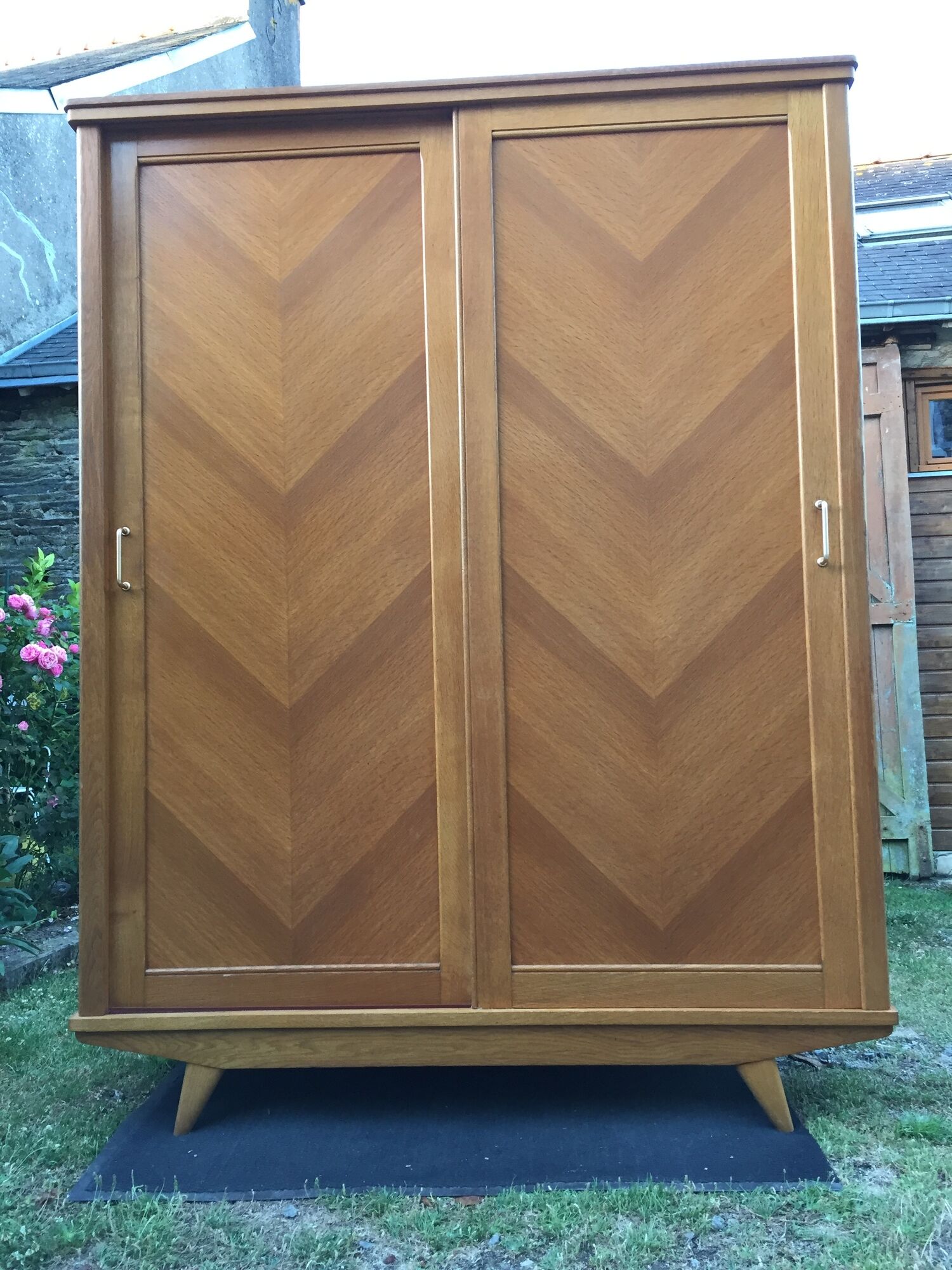 Vintage wardrobe with compass feet in oak and oak cp with 2 sliding doors.
