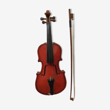 violin and decorative archer in antique varnished wood