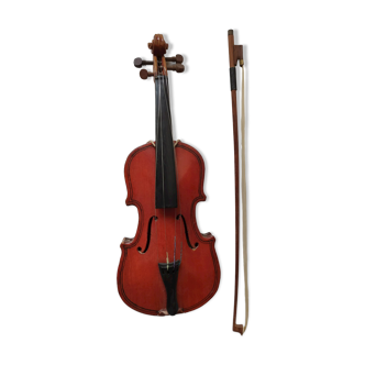 violin and decorative archer in antique varnished wood