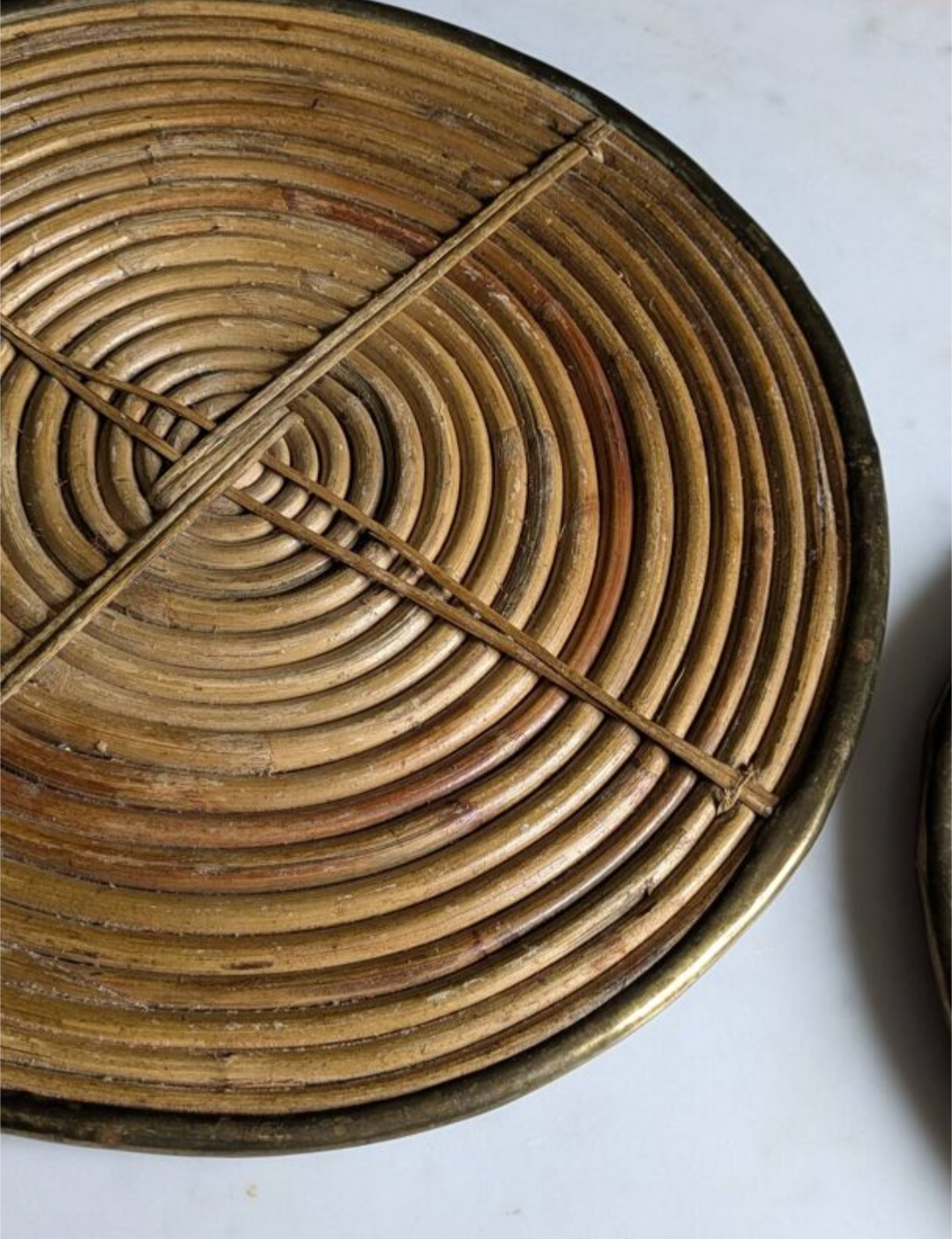 Rattan trivets attributed to Gabriella Crespi.