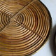 Rattan trivets attributed to Gabriella Crespi.