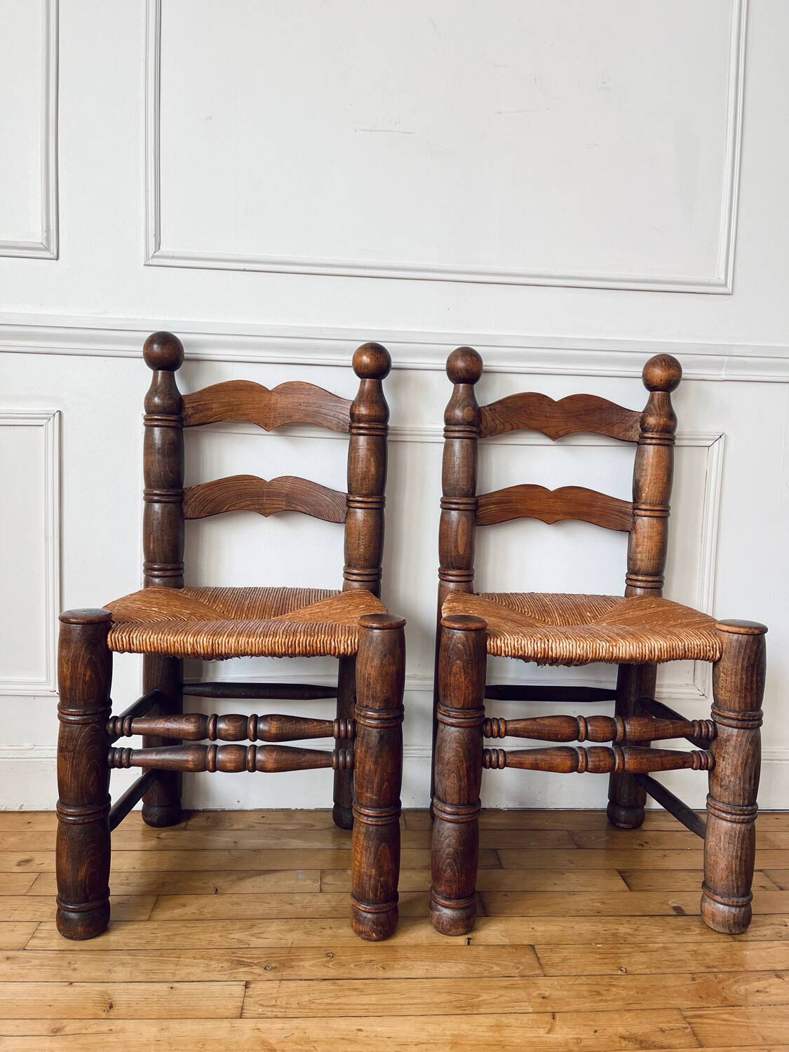 Pair of rustic chairs in the style of Charles Dudouyt.