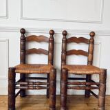 Pair of rustic chairs in the style of Charles Dudouyt.