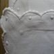 Pair of AL monogrammed pillowcases