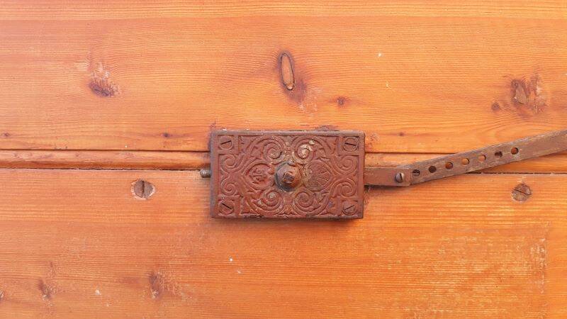 Front door and its frame, translucent glass windows, early 20th century