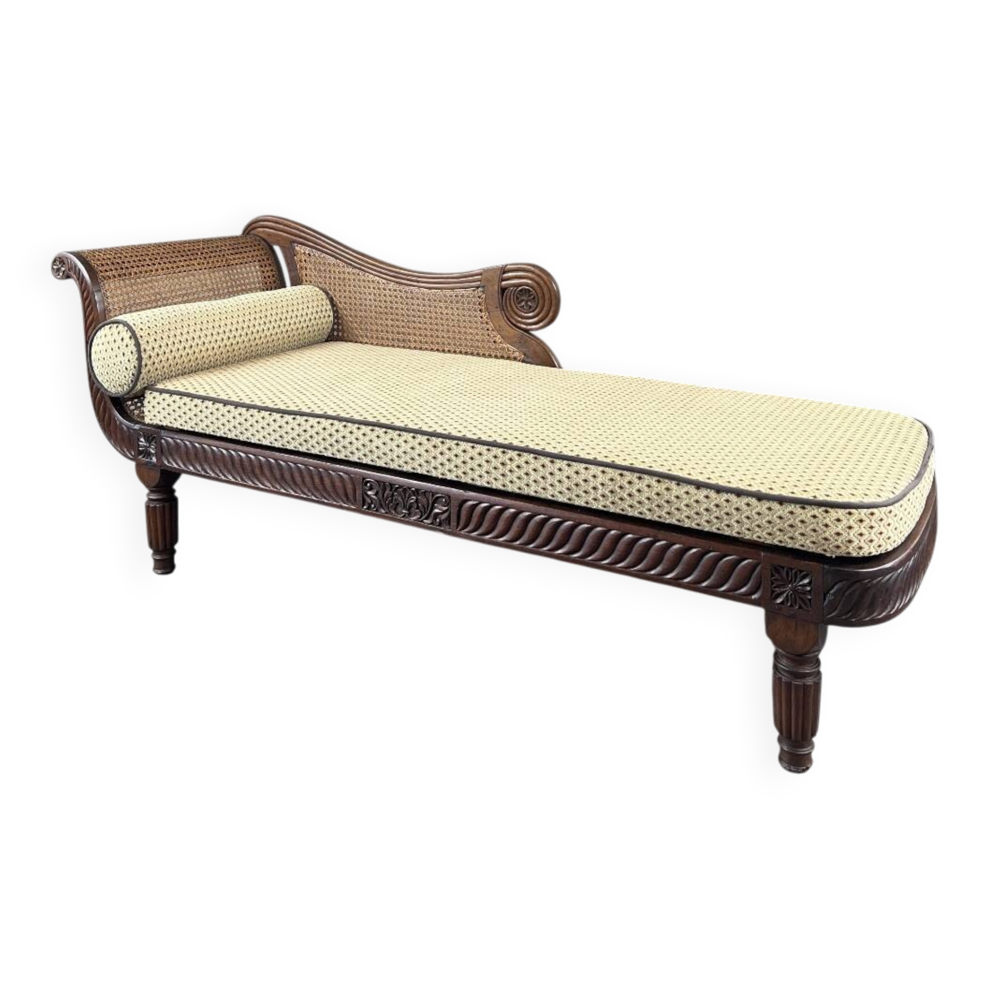 Louis XVI style meridian in carved wood and caning, 19th century.