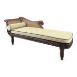 Louis XVI style meridian in carved wood and caning, 19th century.