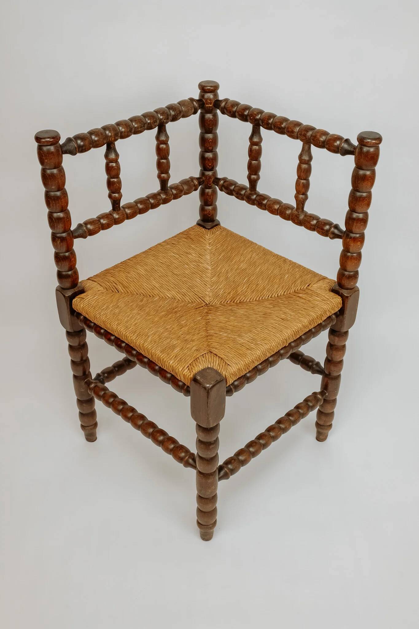 Classic vintage bobbin corner armchair