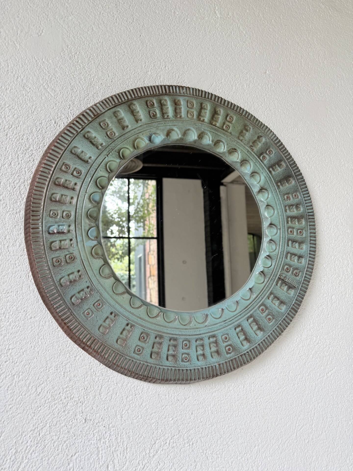 Art mirror Italy in ceramic from the 90s.