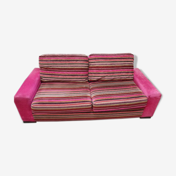 Pink velvet sofa and stripes
