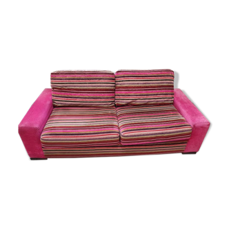 Pink velvet sofa and stripes