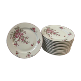 Series of 12 porcelain dessert plates decorated with flowers Bernardaud Limoges