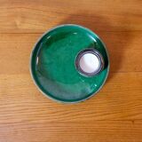 Glazed green earthenware candlestick