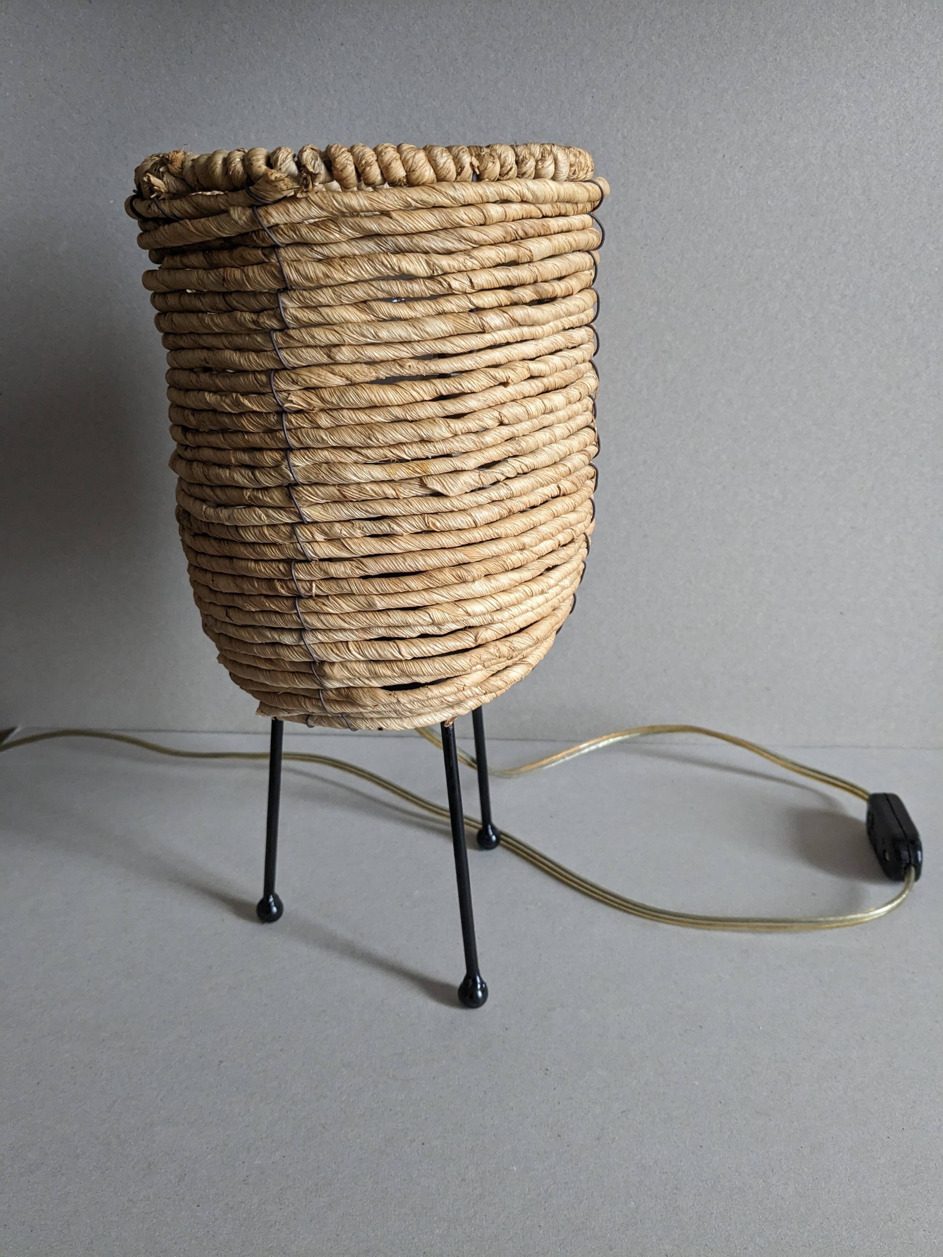 Fiber and metal tripod lamp