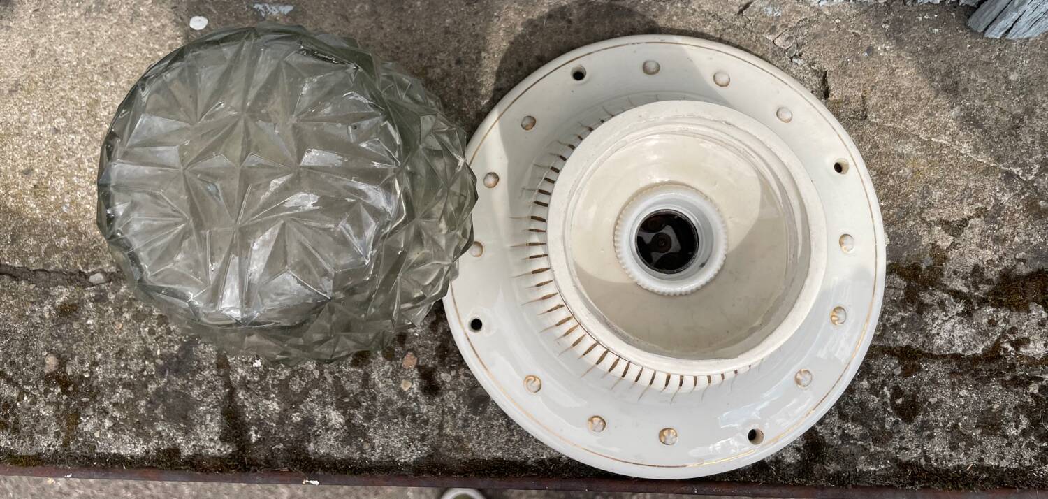 Art Deco ceiling light with a porcelain base.