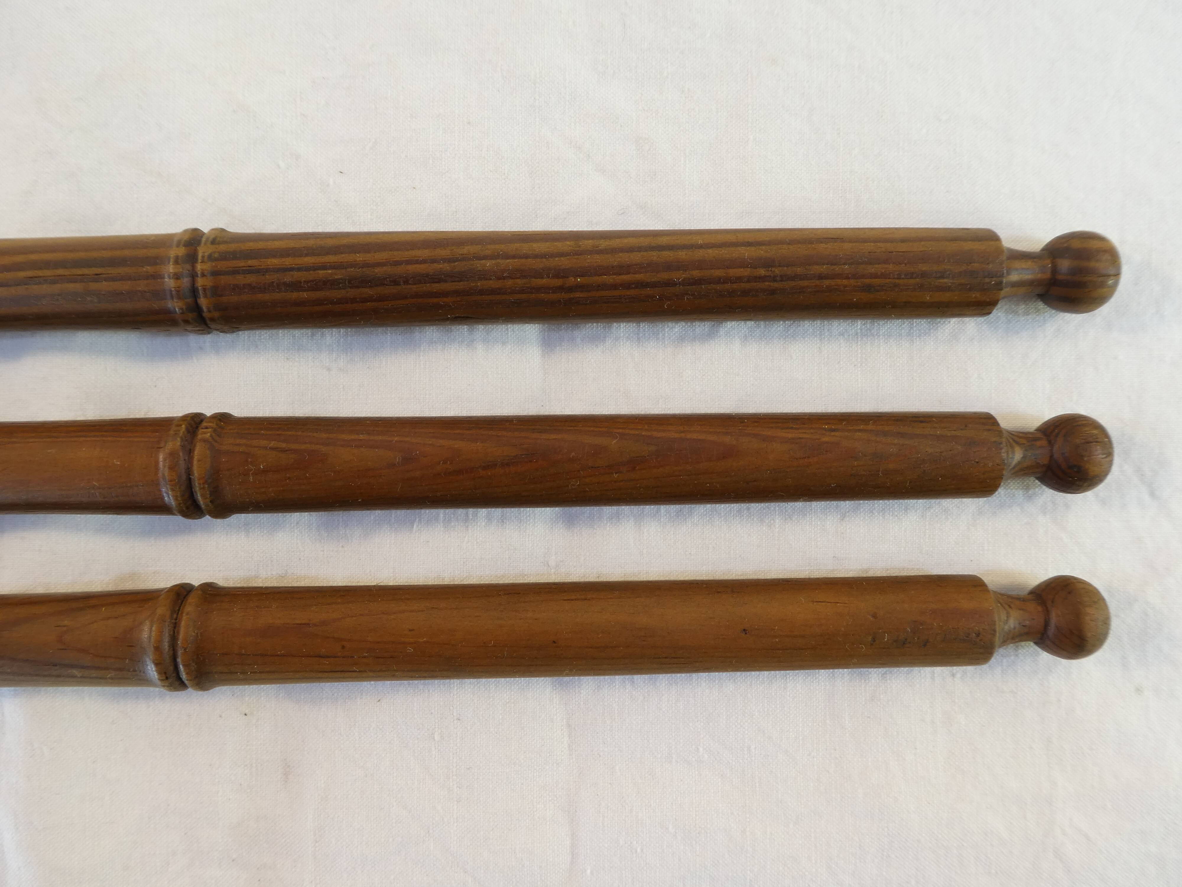 Antique towel rack has three arms