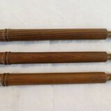 Antique towel rack has three arms