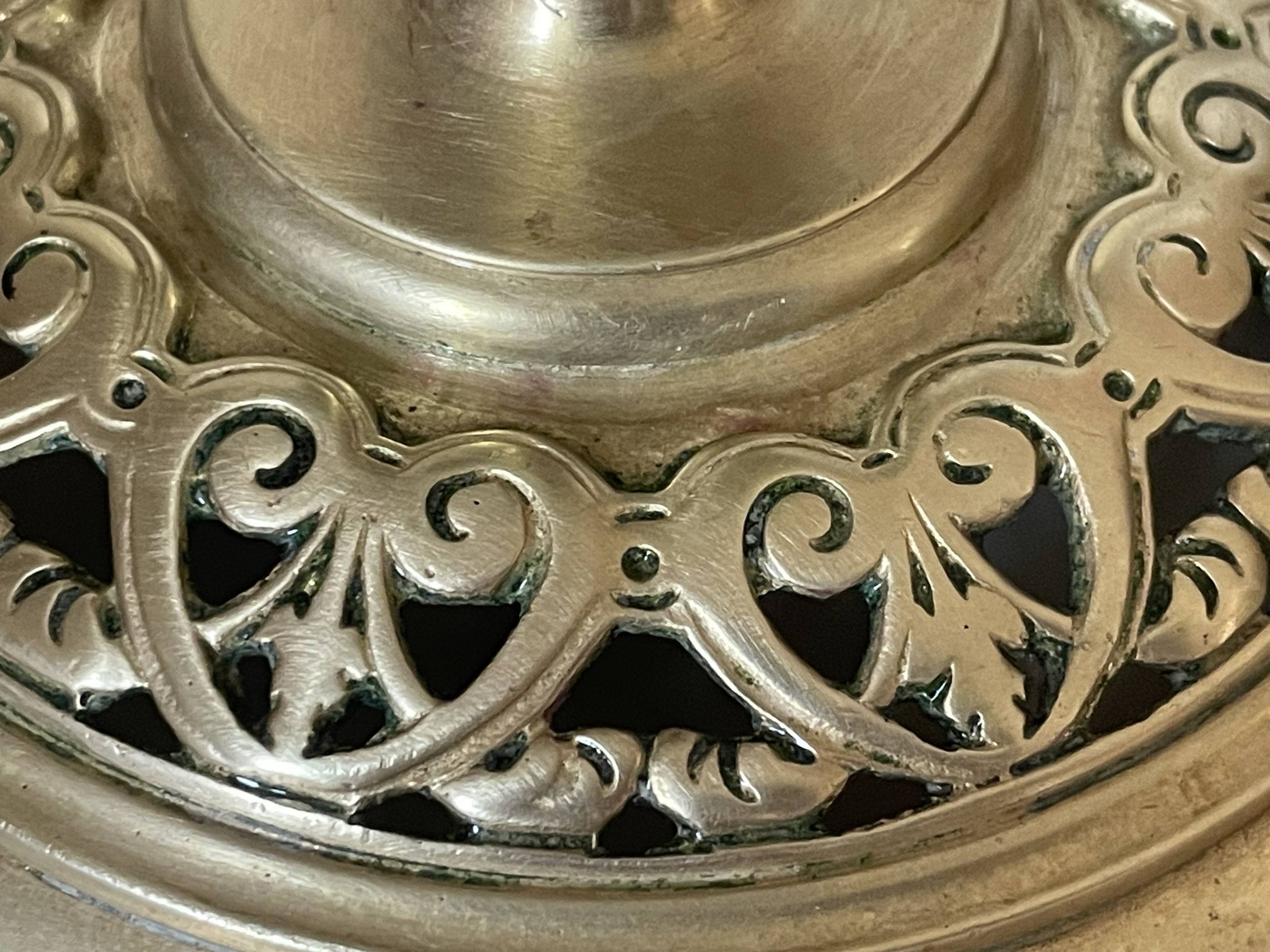 pair of openwork gilded brass candlesticks from the 19th century