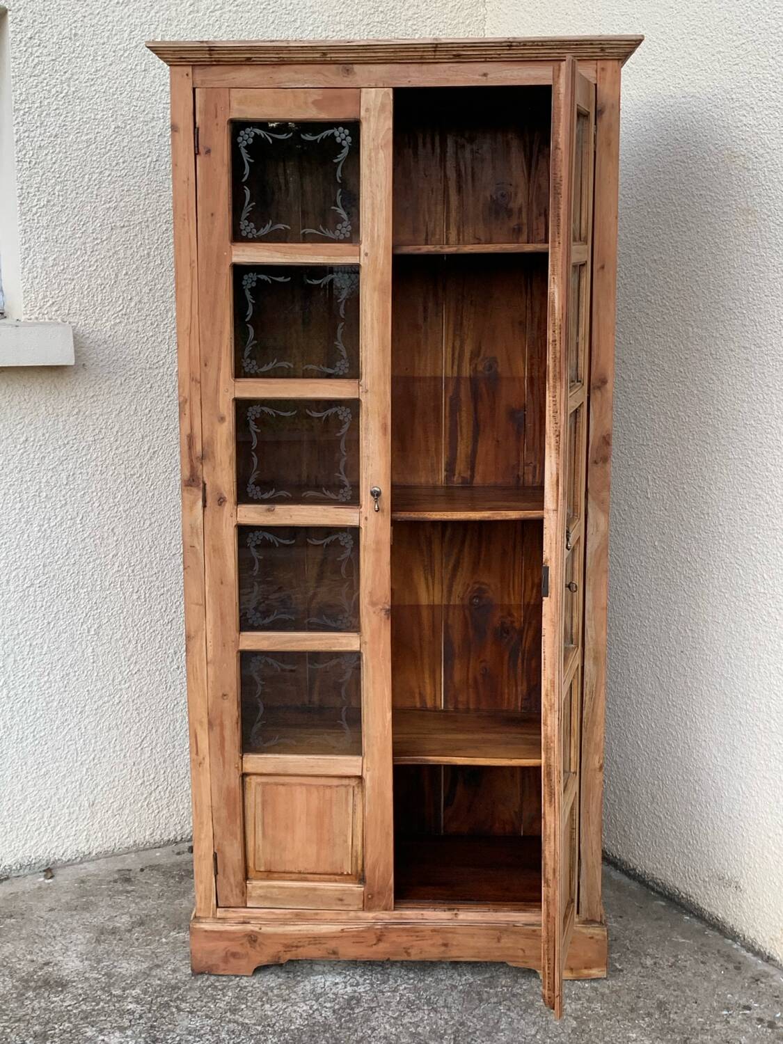 Parisian wardrobe in raw wood with engraved glass from 1920.