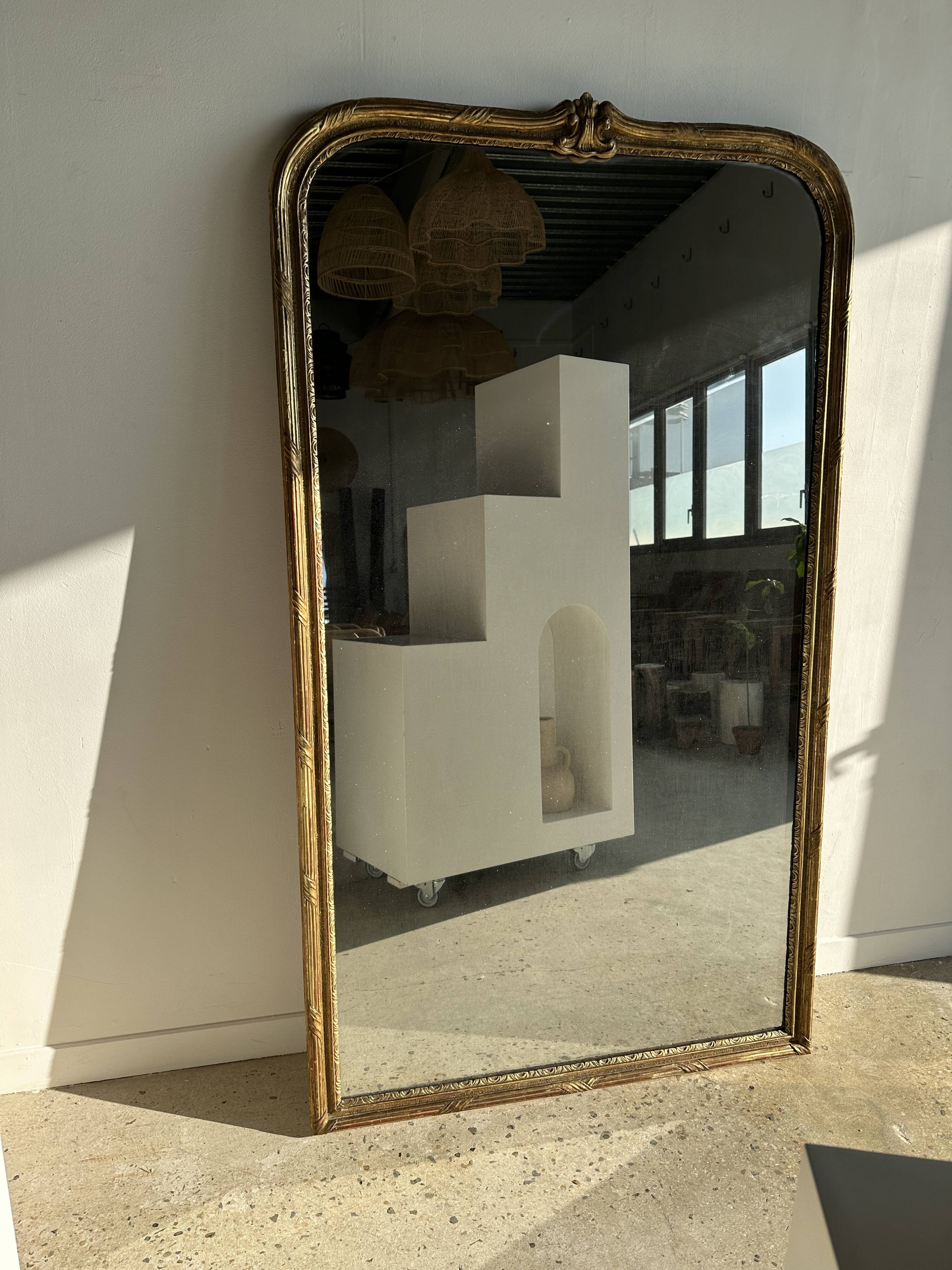 Large gilded mirror 19th century rounded corners mercury glass Louis XVI style