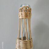 Glass and rattan bottle