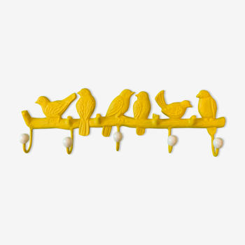 Yellow birds coat holder