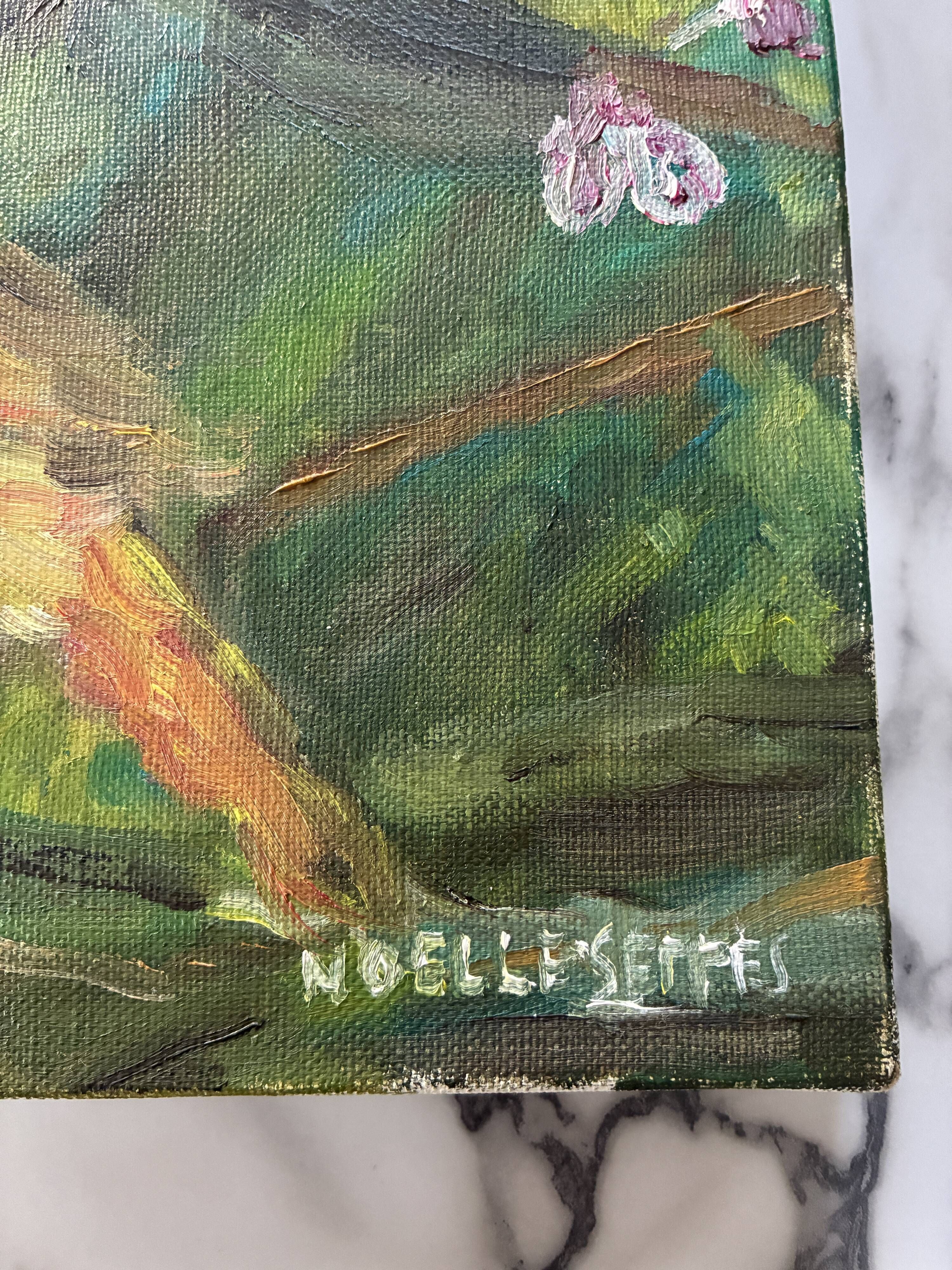 Oil painting still life of a goldfinch.