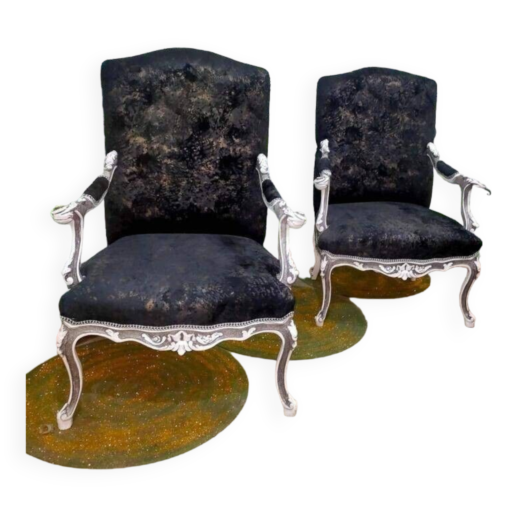 Black Louis XV style armchairs