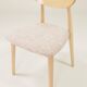 Set of 6 soft pink fabric dining chairs, Scandinavian design, natural wood.