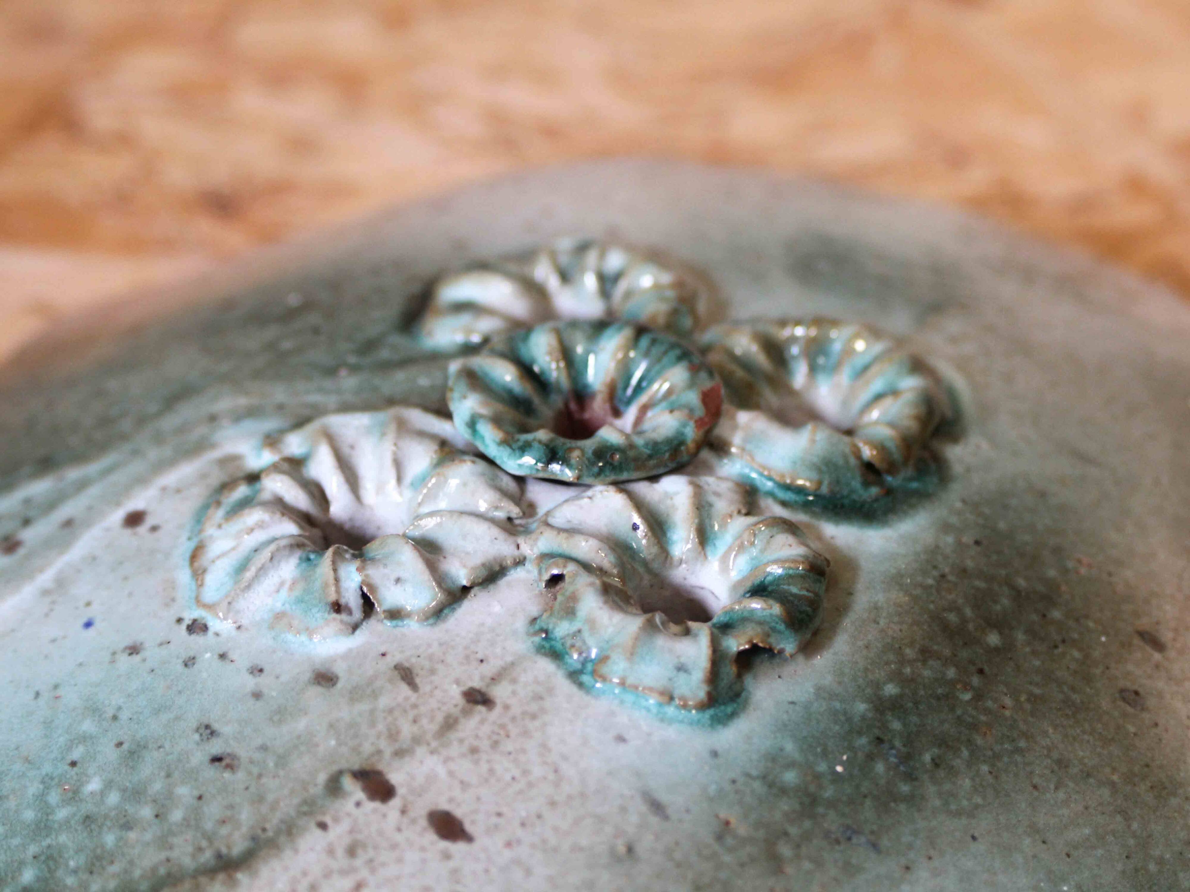 Ceramic flower holder
