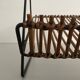 Mid-century black metal and rattan magazine rack, 1960, Italy