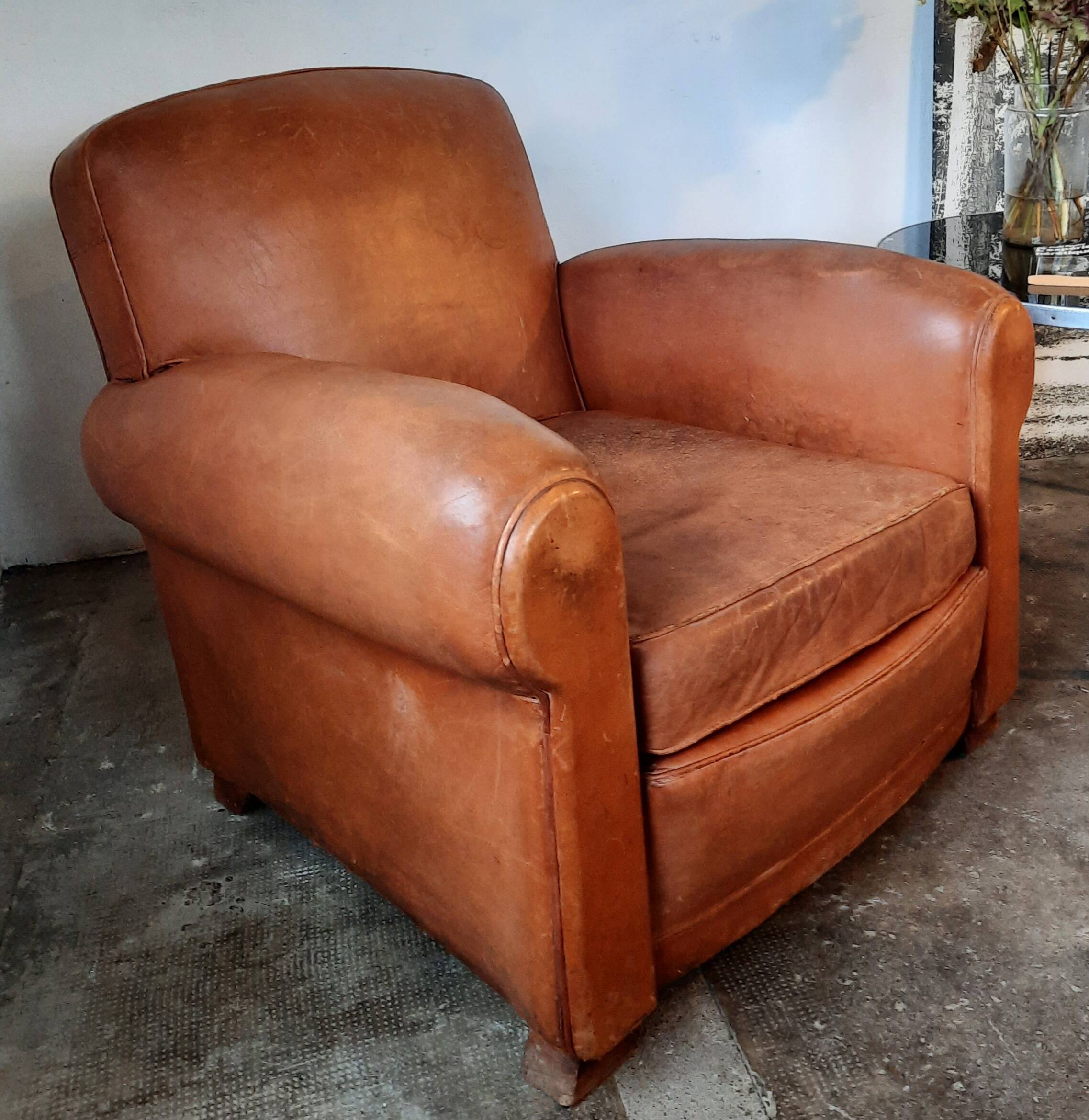 Old leather club chair 1940-1950