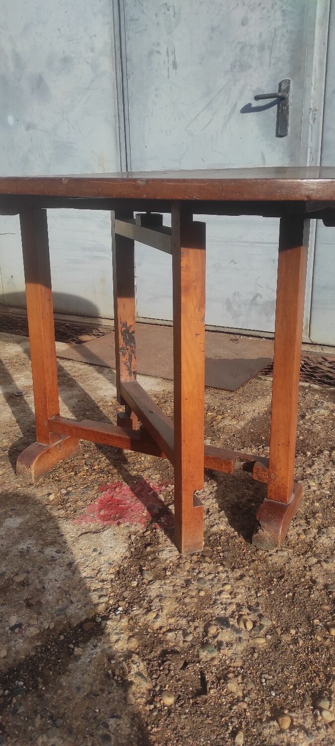 Old rustic oval folding wooden farmhouse table