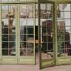 Four partition doors with small panes in 19th century patinated wood
