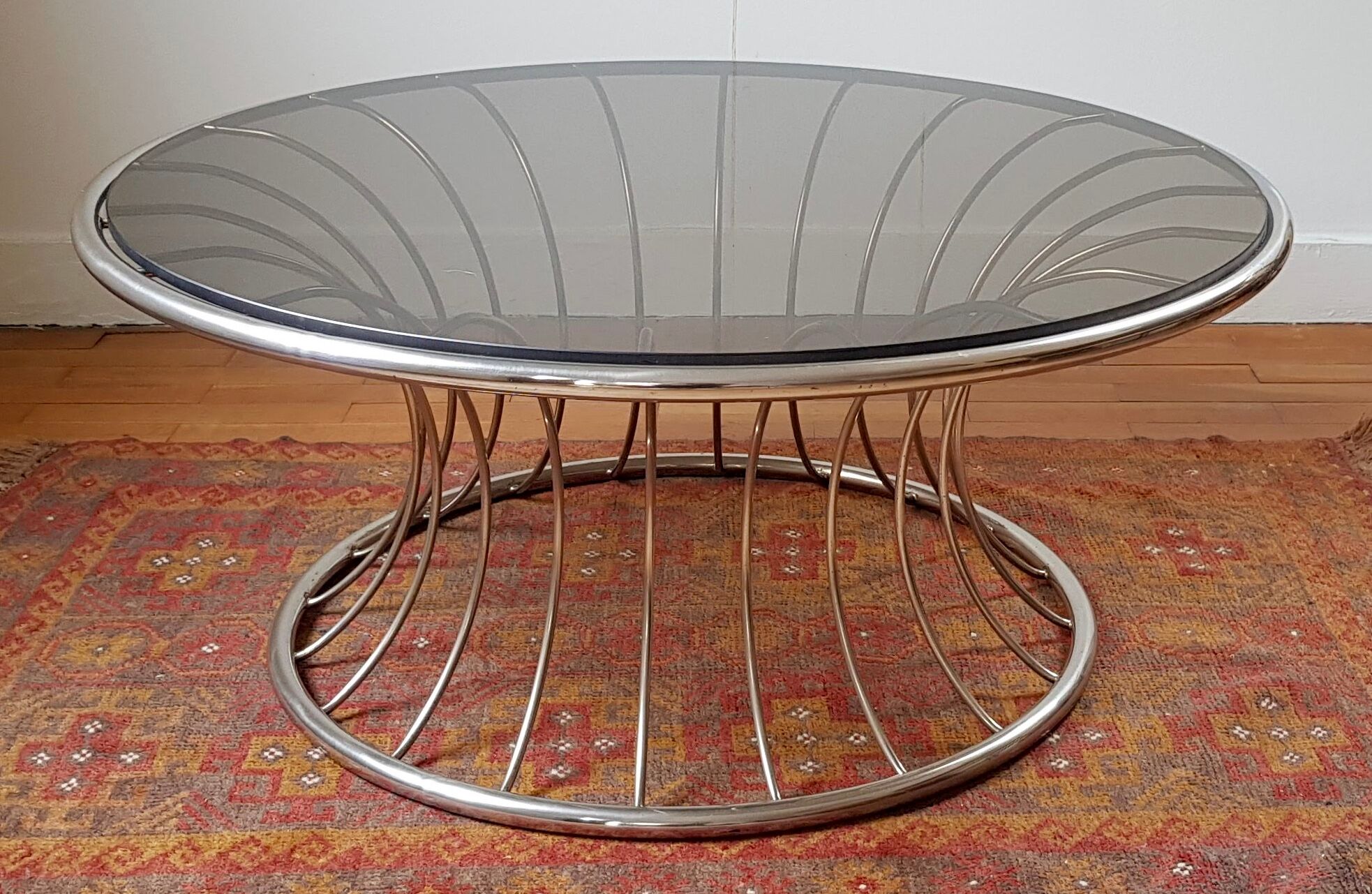Chromium round coffee table and smoked glass