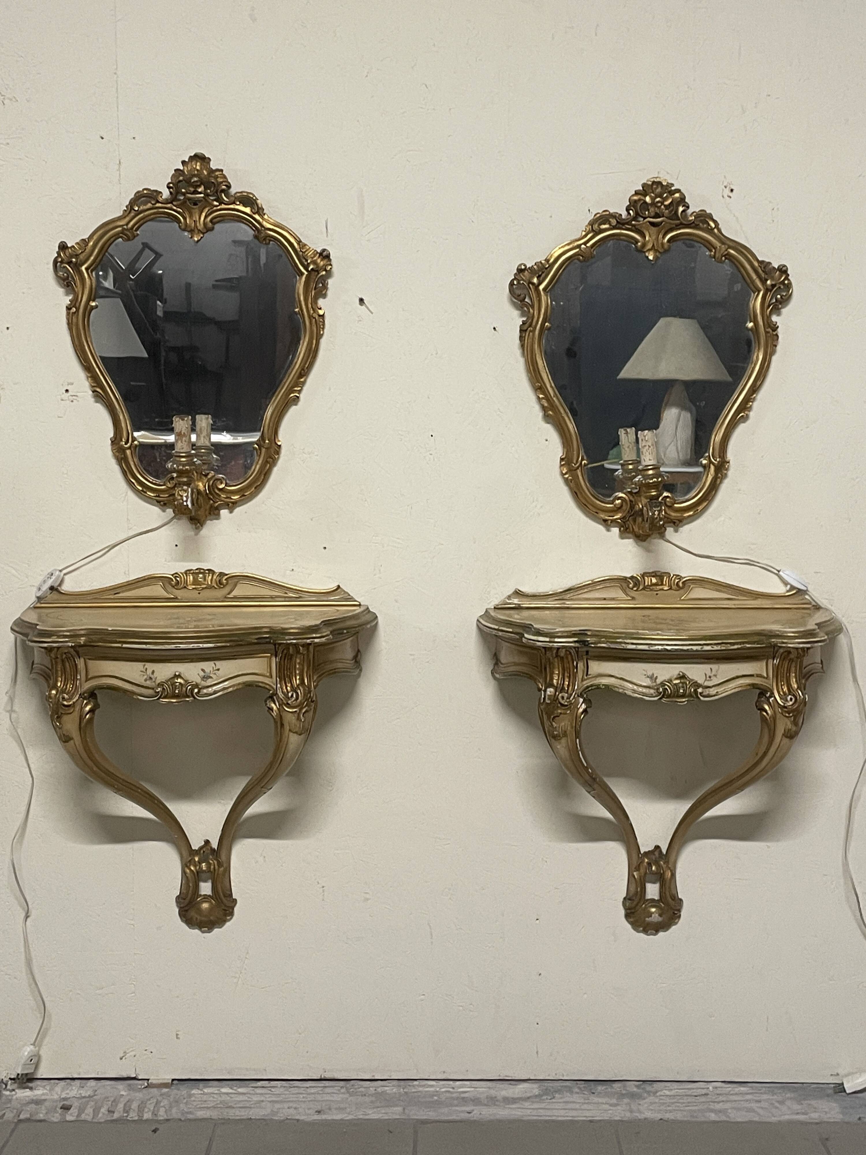Pair of wall-mounted consoles with a mirror in Louis XV style.