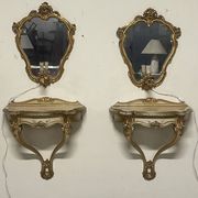 Pair of wall-mounted consoles with a mirror in Louis XV style.