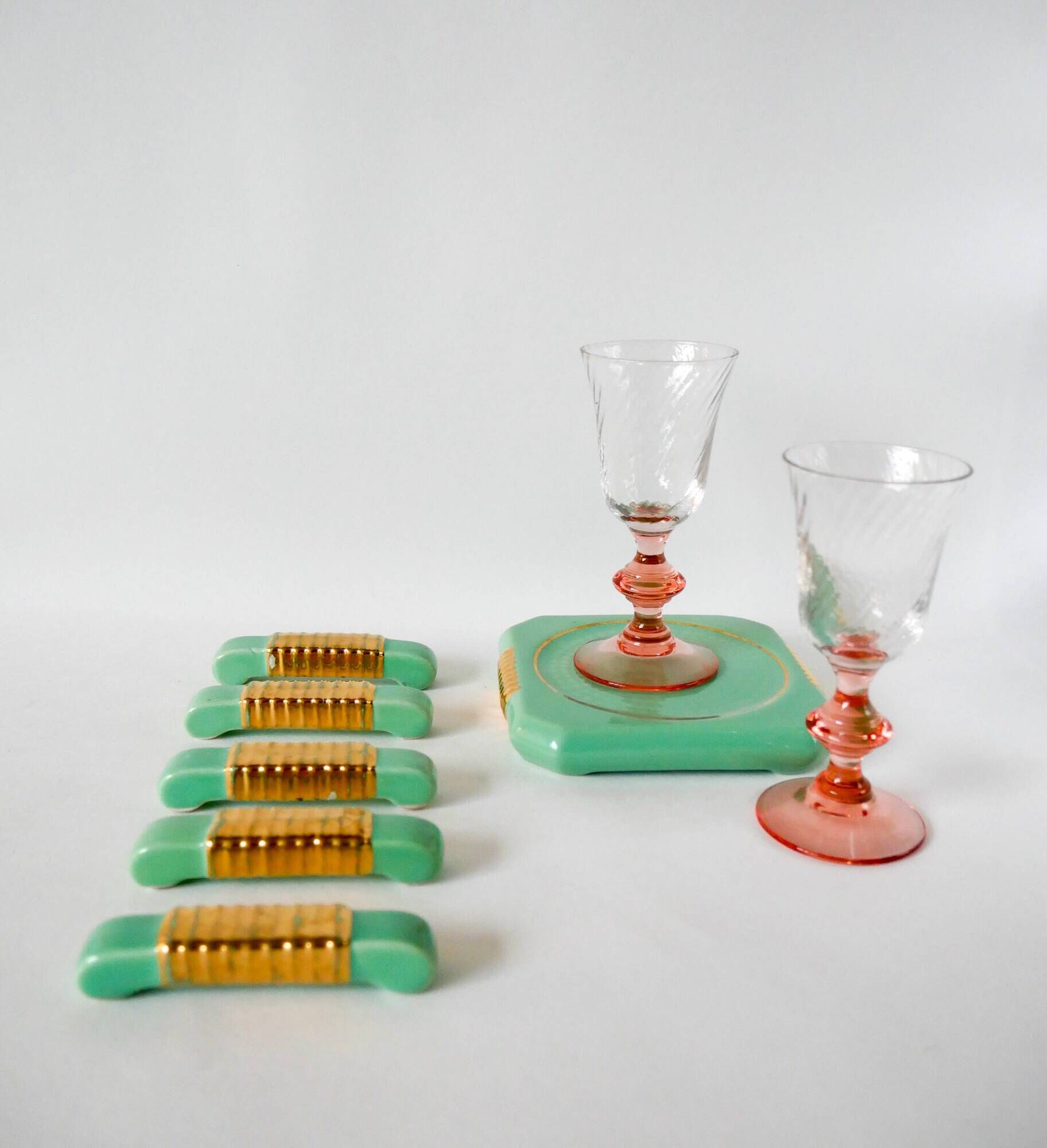 set of coasters and knife holders in mint green and gold art deco ceramic 1930