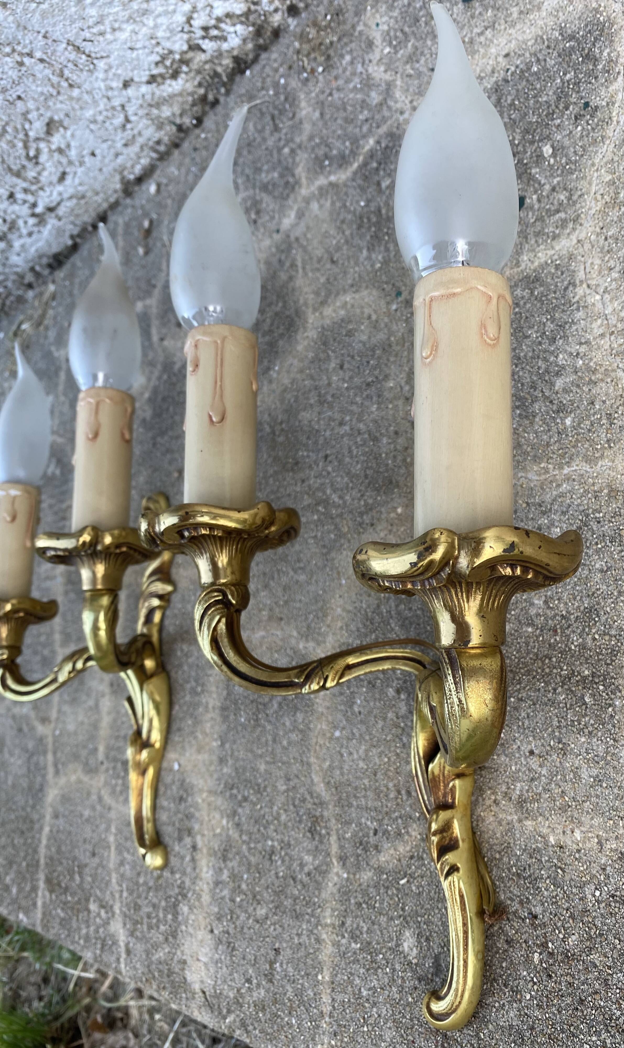 Pair of baroque gilt bronze wall lamps