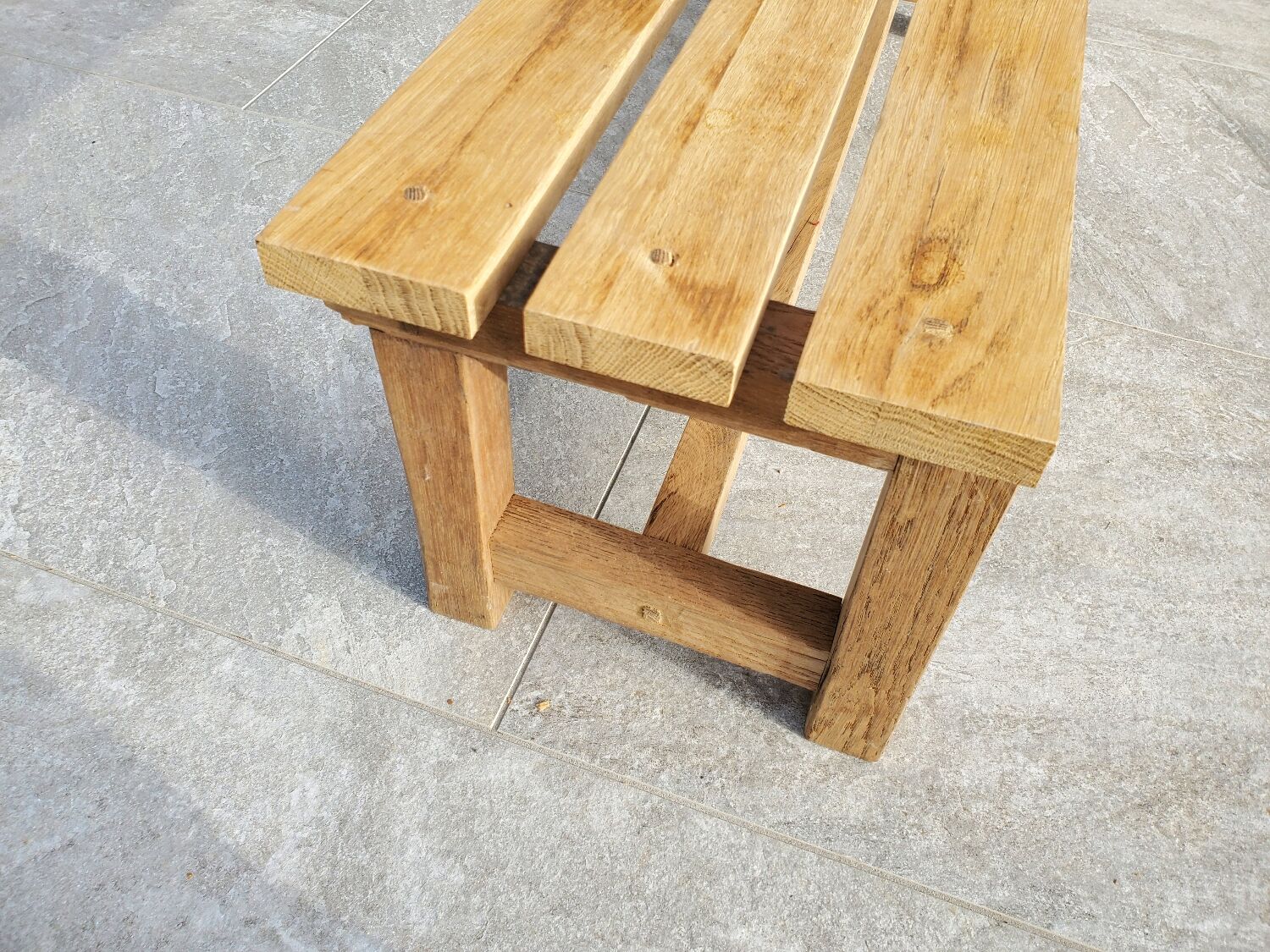 Small bench in raw oak