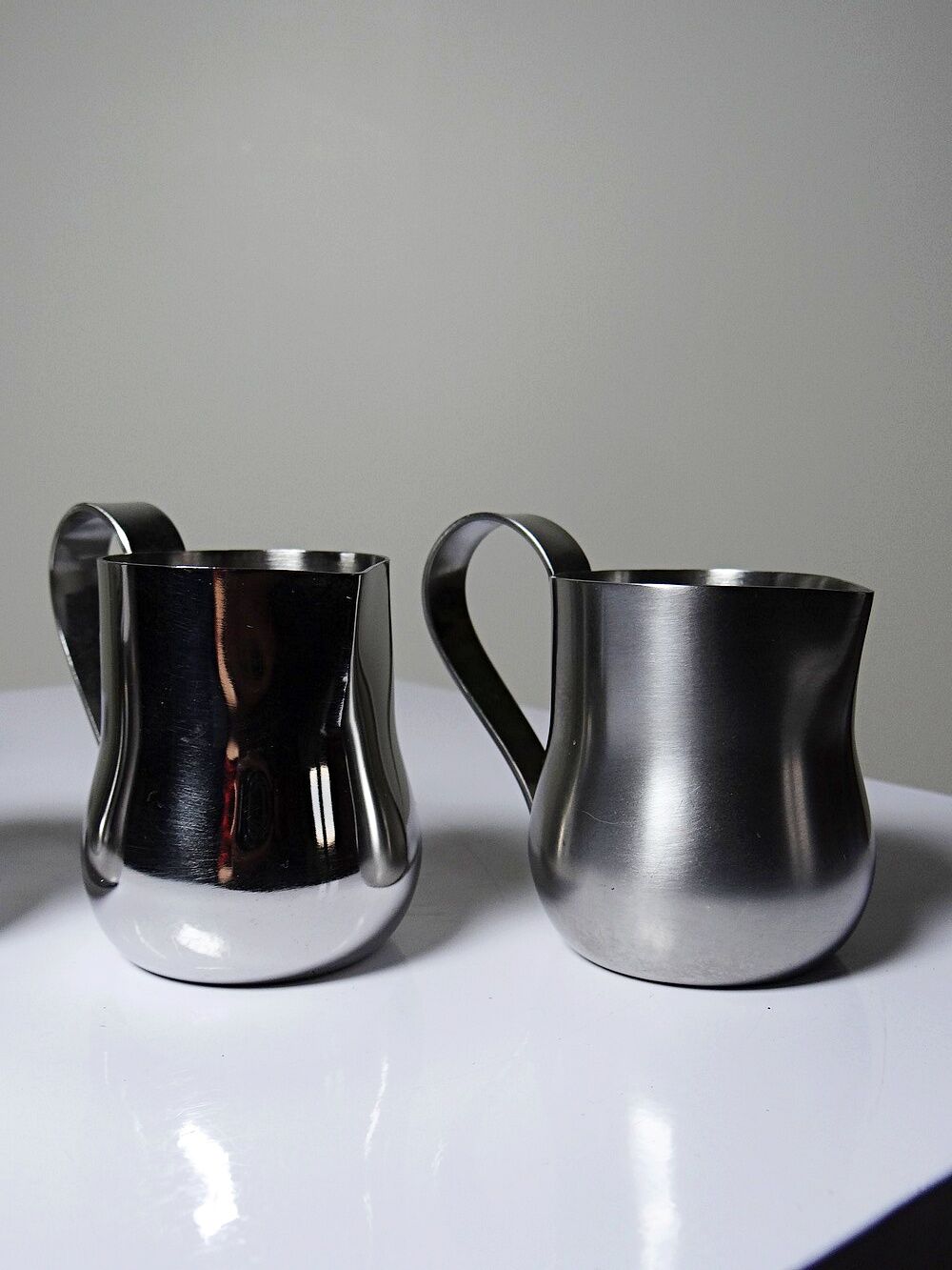 Set of 4 vintage bar measures in brushed stainless steel from the 60s-70s.