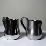 Set of 4 vintage bar measures in brushed stainless steel from the 60s-70s.