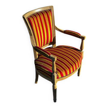 Louis XVI cabriolet armchair – patinated wood and striped velvet