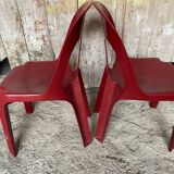 Pair of antique chairs stamp design henri massonnet red plastic 80's
